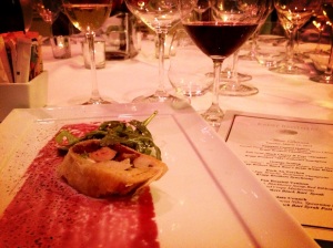 Foie gras wrapped in a pear and black cherry strudel.